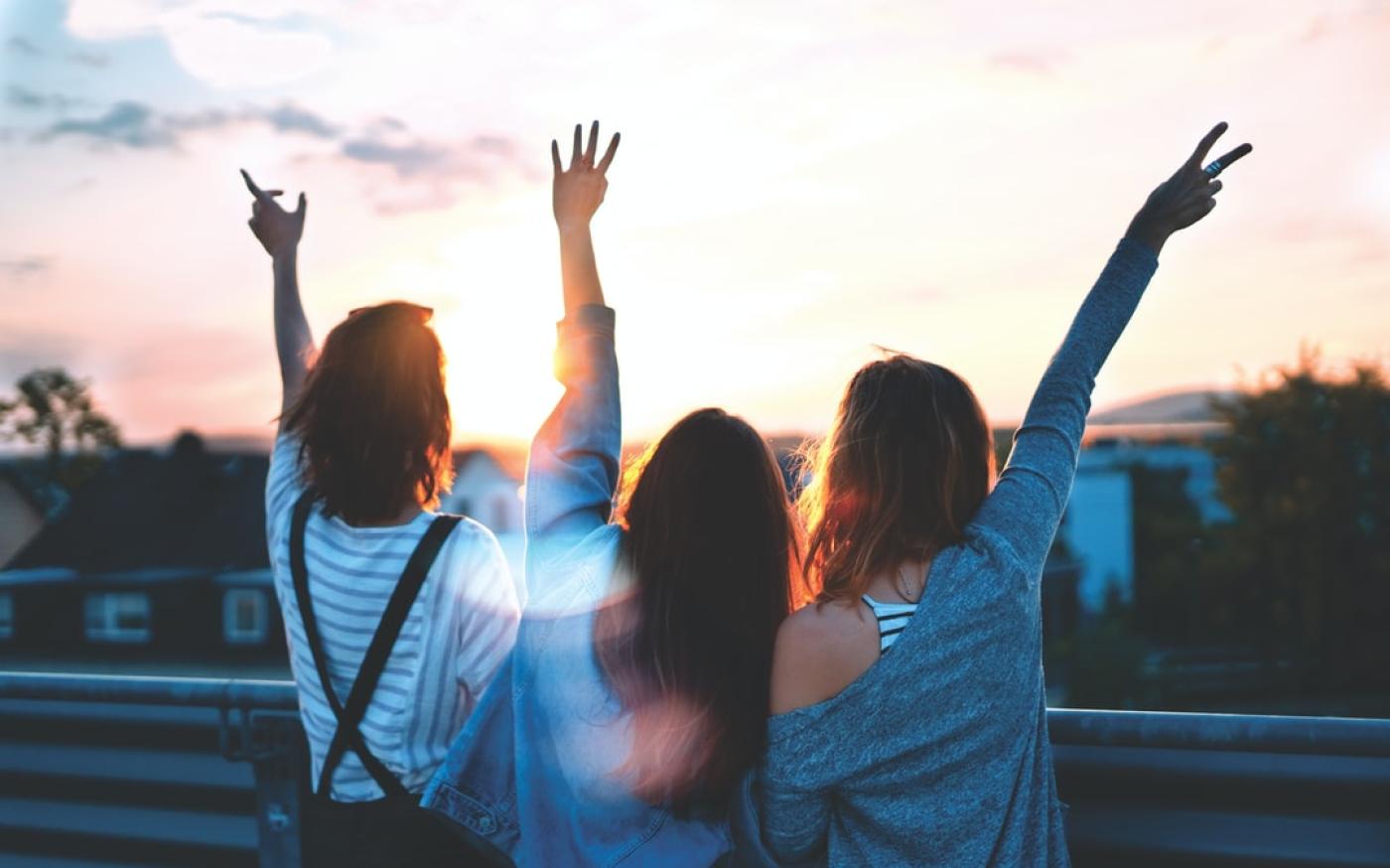 Image of 3 ladies enjoying the sunset