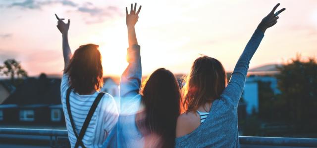 Image of 3 ladies enjoying the sunset